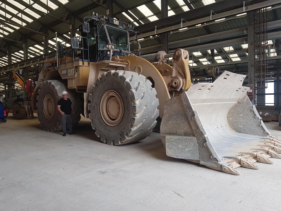 Installation chez « Carrière de la vallée heureuse » CAT 990 K